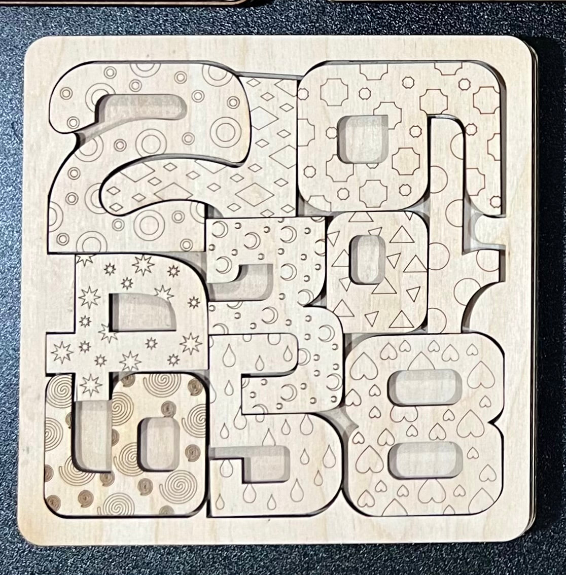 Unfinished wood square puzzle with numbers 2, 0, 1, 9, 3, 8, 6, 5, and 4.