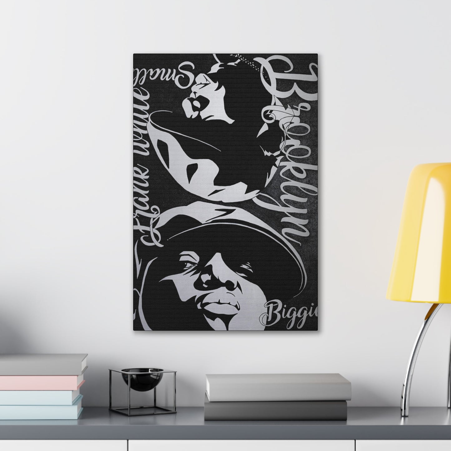 A black and white canvas print featuring two portraits of Biggie Smalls.