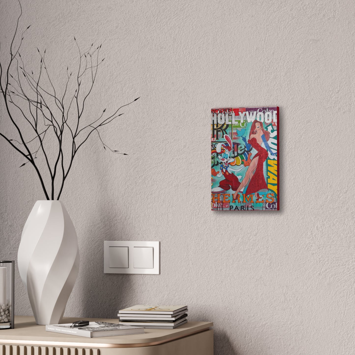 A canvas gallery wrap featuring Roger and Jessica Rabbit hangs on a textured wall.