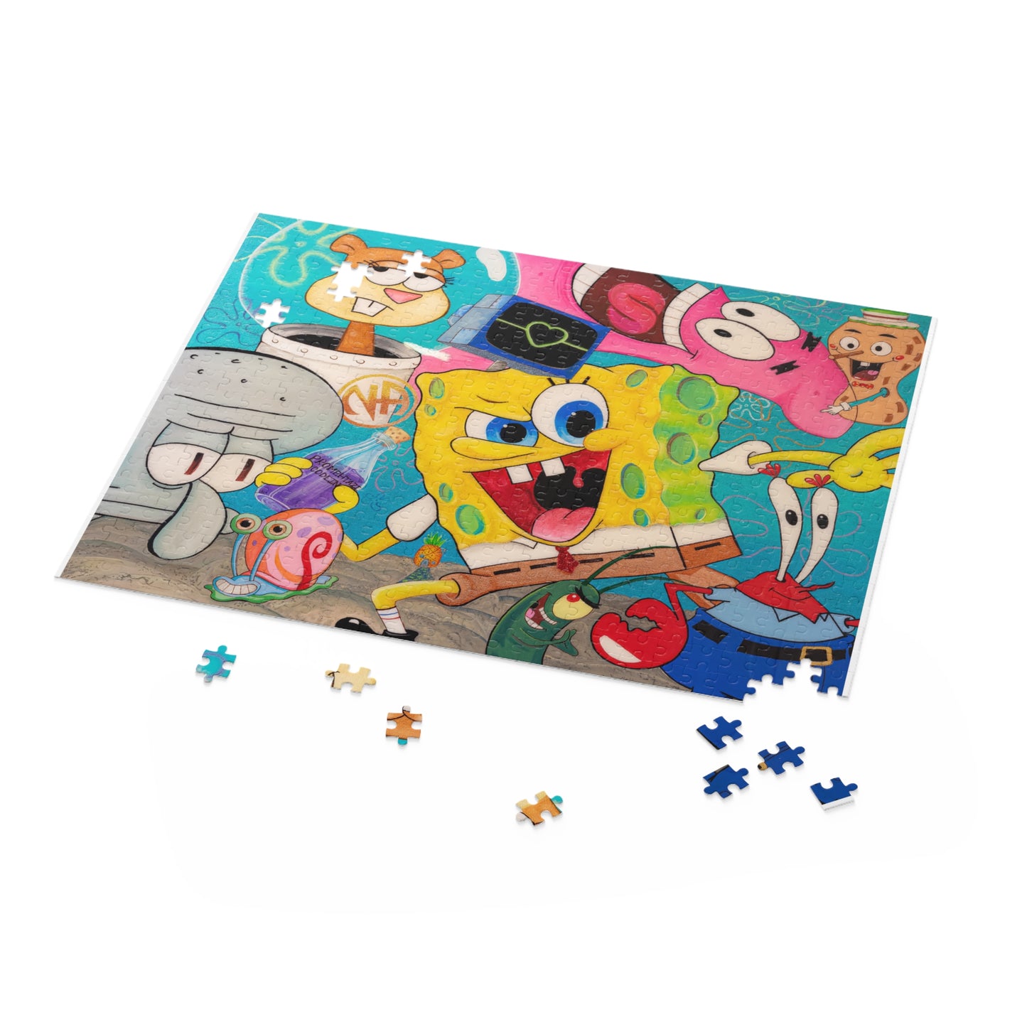 A partially completed Spongebob Squarepants puzzle with several loose pieces scattered around it.
