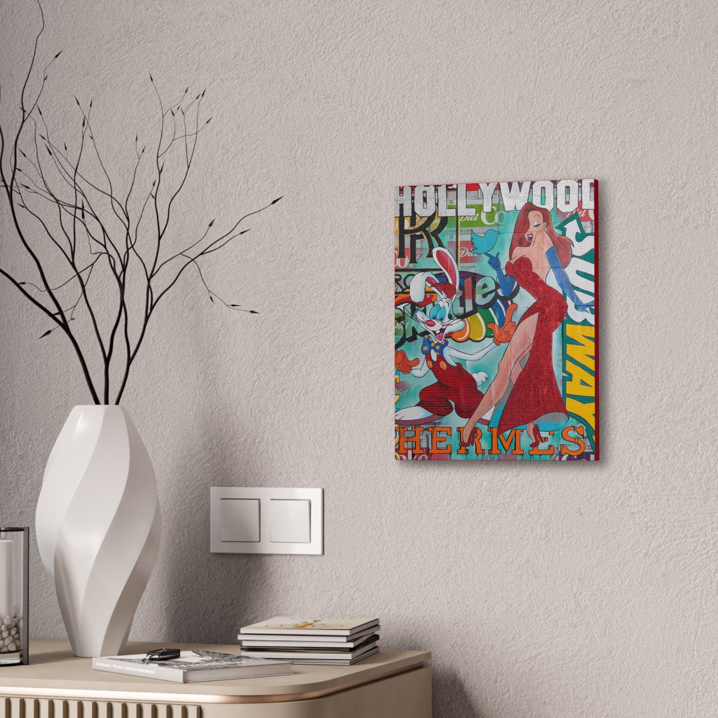 A canvas gallery wrap featuring Roger and Jessica Rabbit hangs on a textured wall.