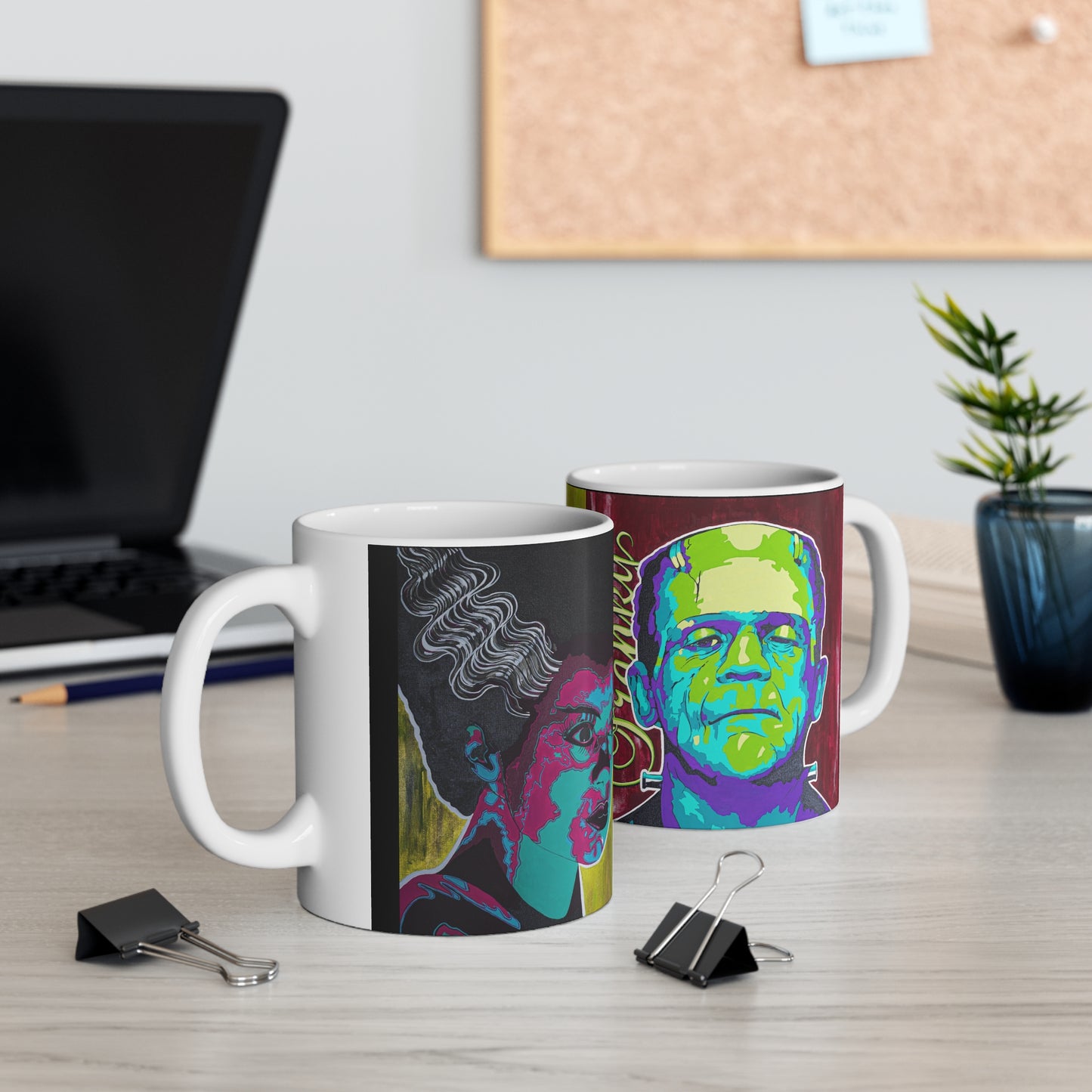 Two white ceramic mugs featuring pop art style portraits of Frankenstein and his bride.