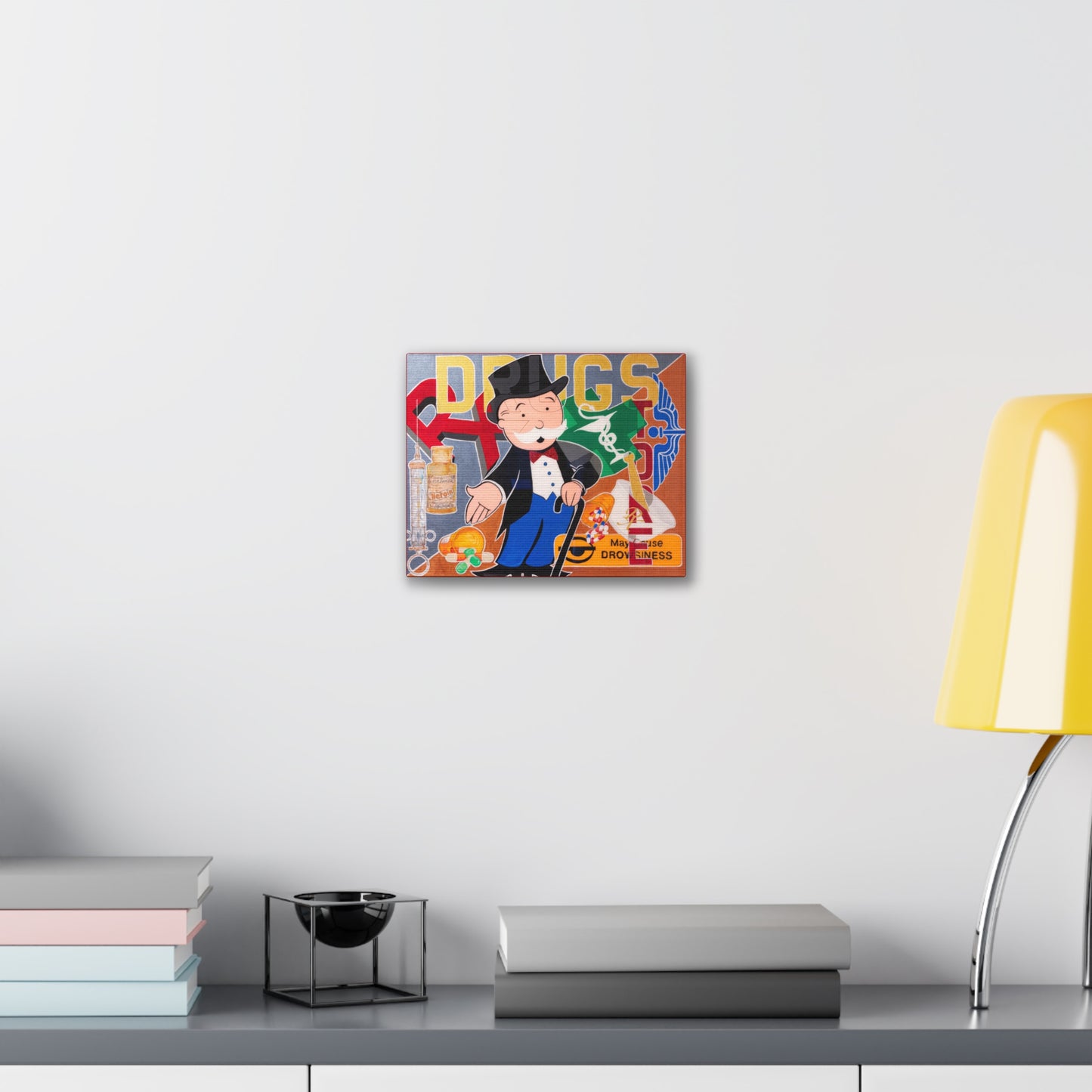 A canvas gallery wrap featuring a Monopoly man surrounded by drug-related imagery.
