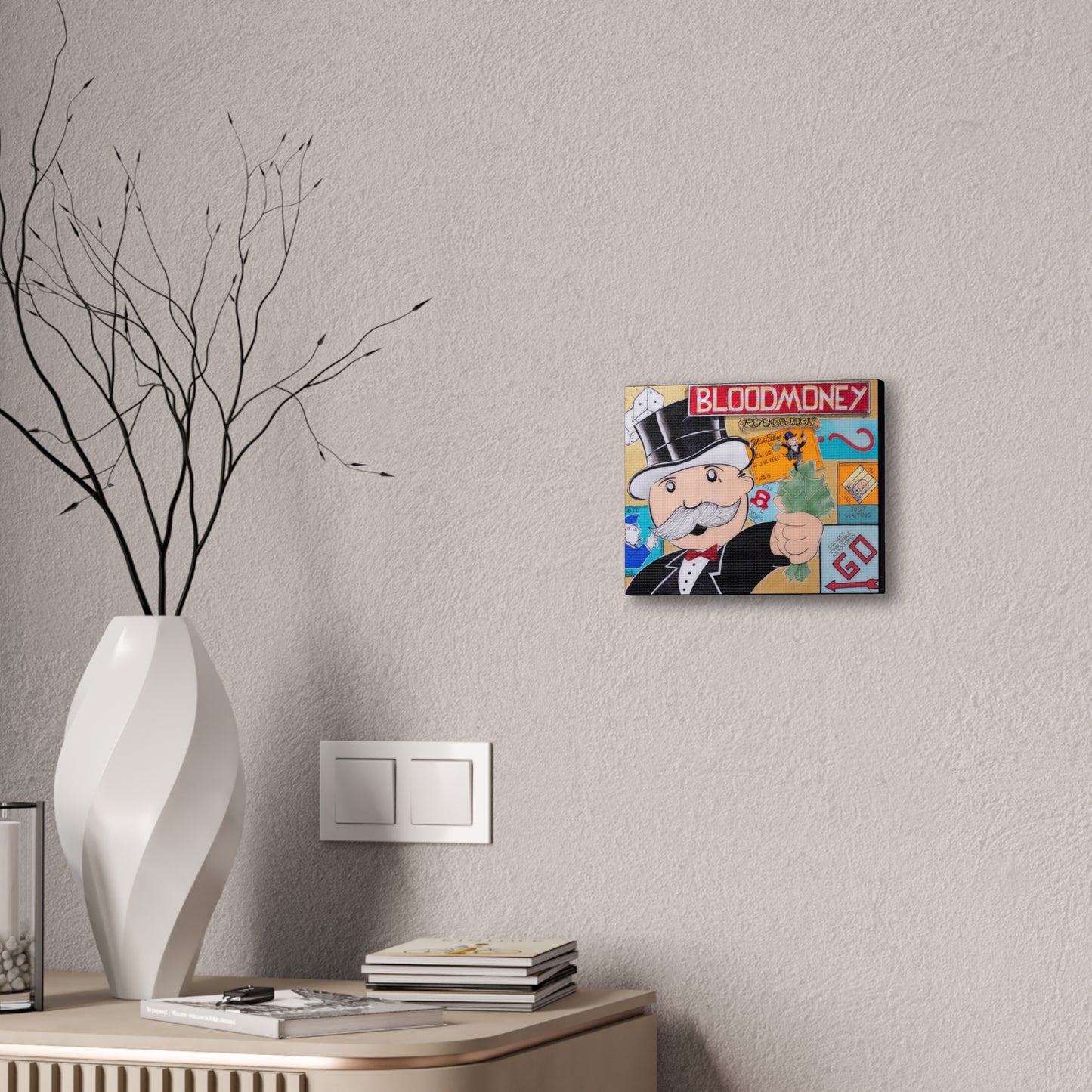 Bloodmoney canvas gallery wrap featuring a Monopoly man with a thumbs up.