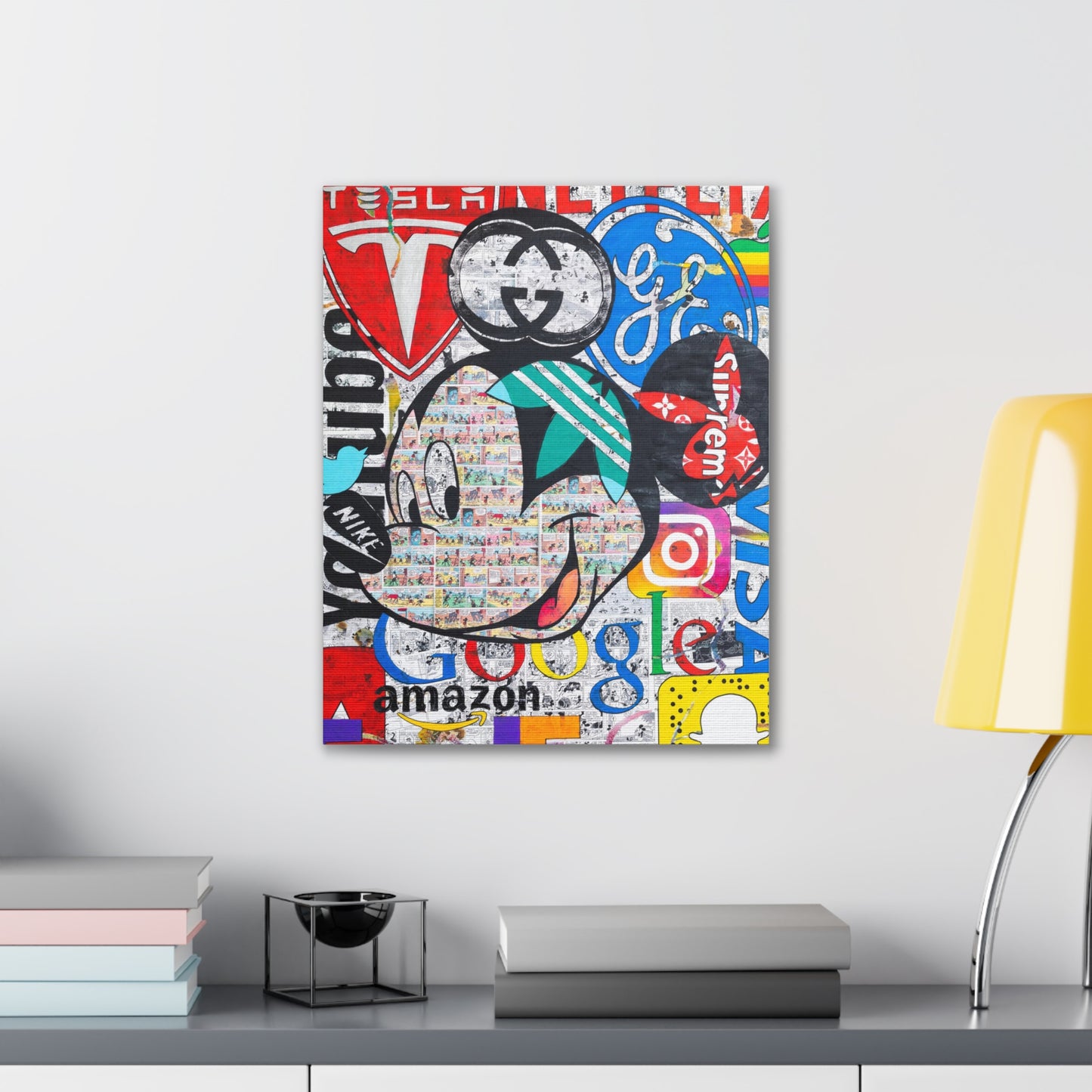 A canvas gallery wrap features a Mickey Mouse collage of brand logos.