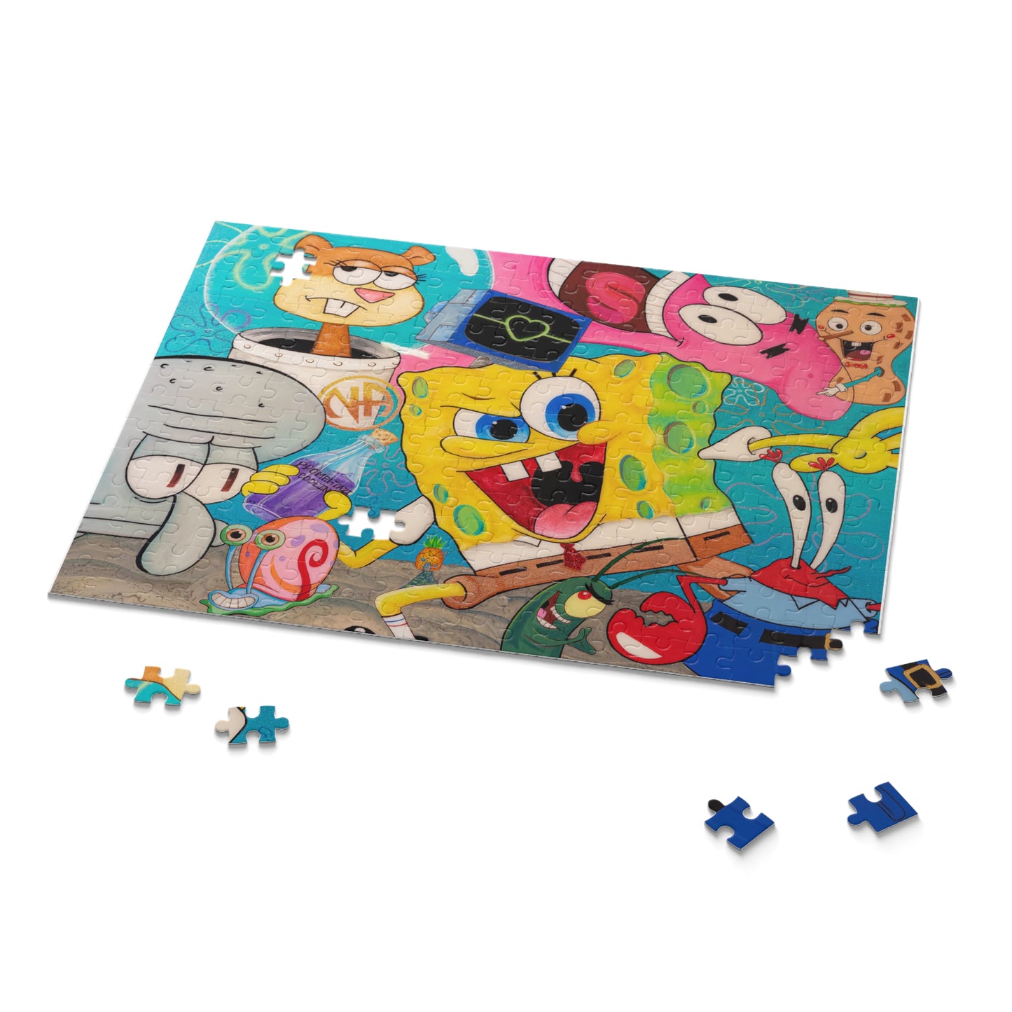 A partially completed Spongebob Squarepants puzzle with several loose pieces.