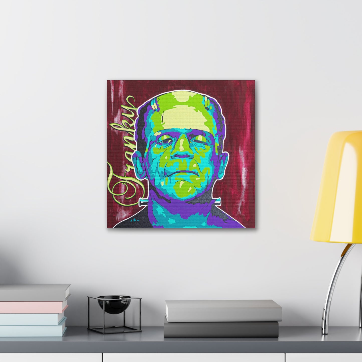 A canvas print of Frankenstein's monster in pop art style, with "Franky" written vertically.