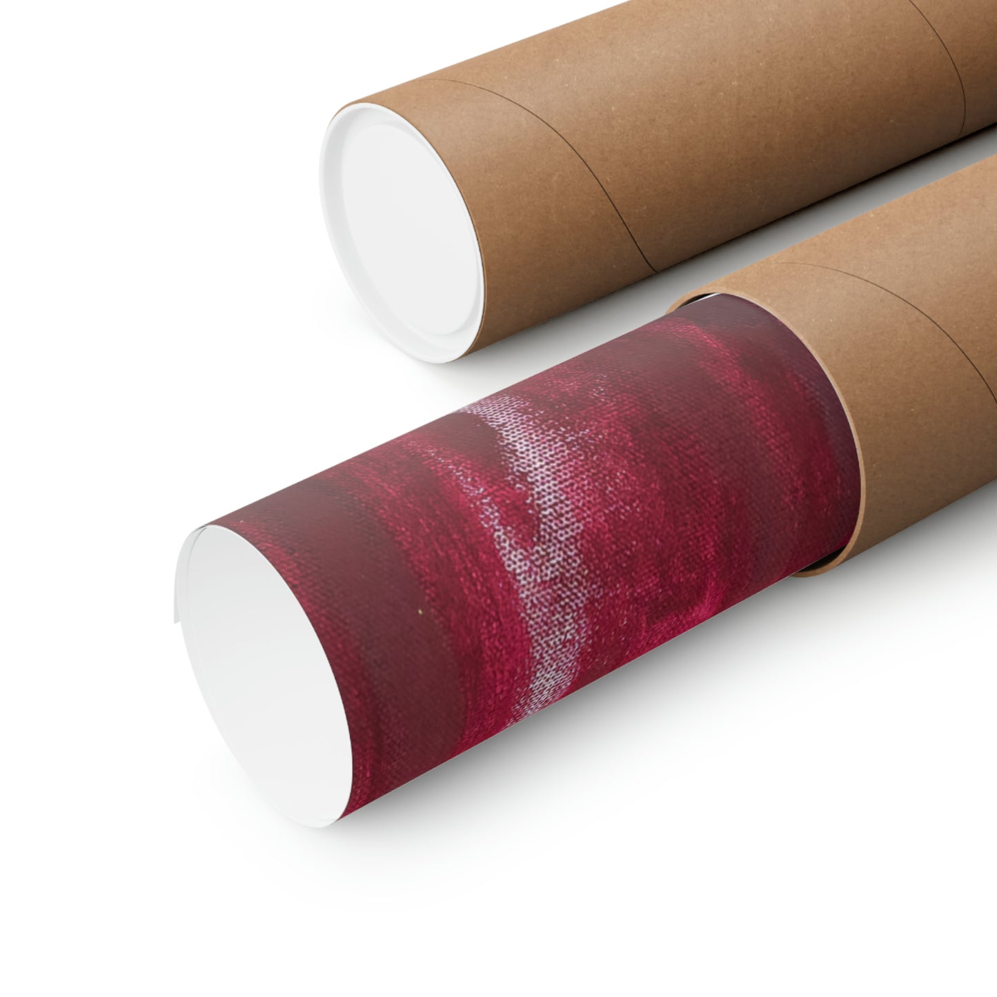 Two matte posters, one rolled up and one partially unrolled, display a red abstract design.