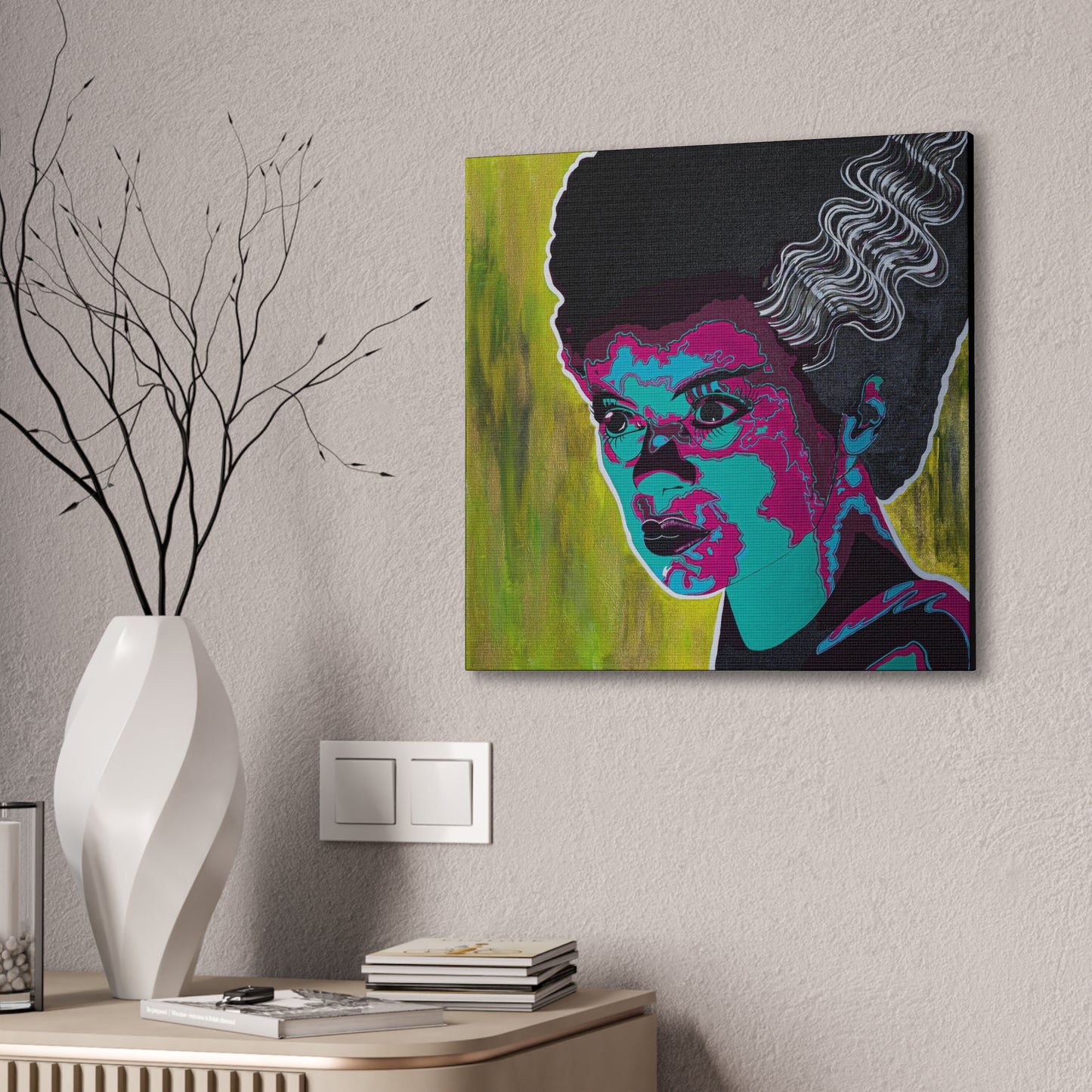 A vibrant pop art canvas print of Franky's Bride hangs on a textured wall.