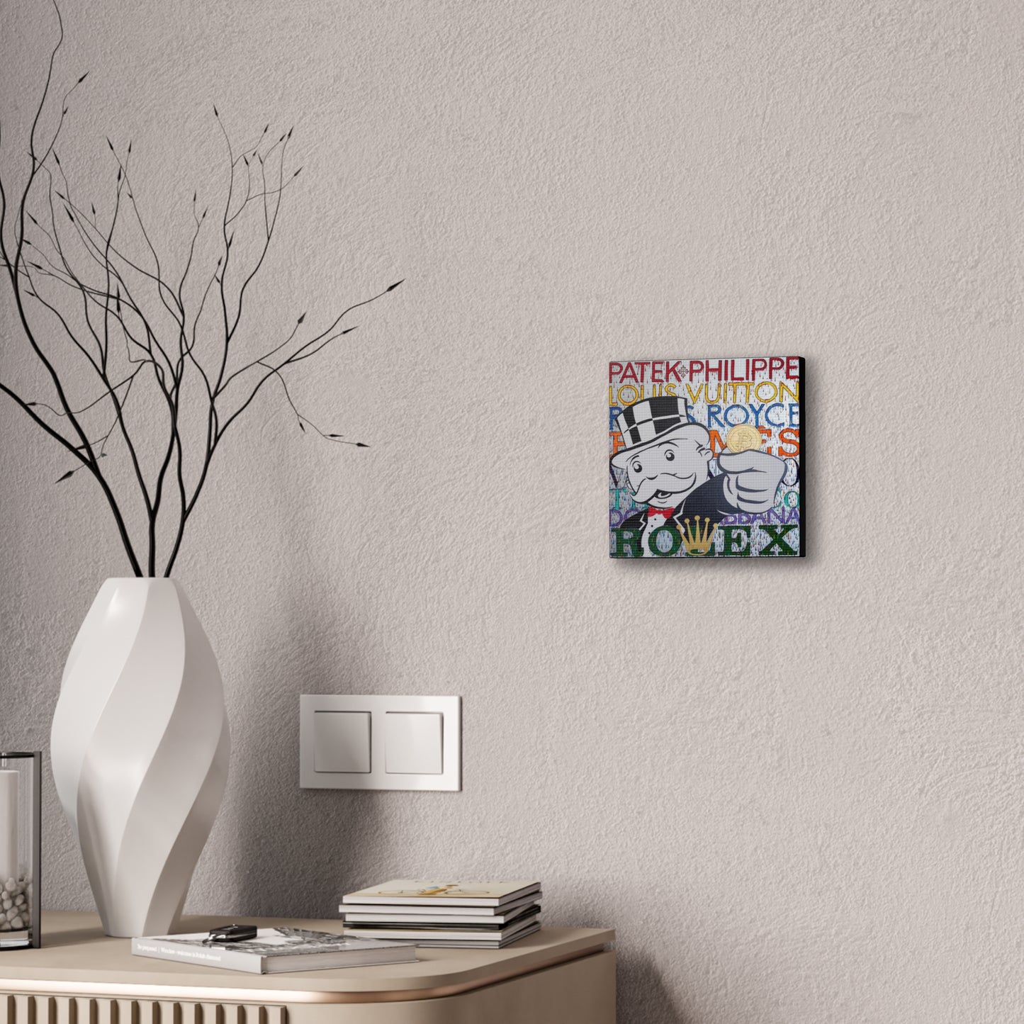 A canvas gallery wrap featuring a Monopoly man holding a Bitcoin, with luxury brand names.