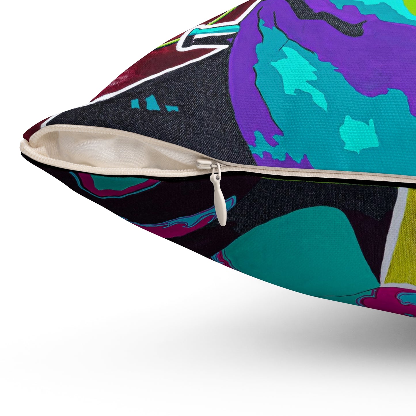 A colorful pillow with a concealed zipper, featuring abstract purple, teal, and black designs.