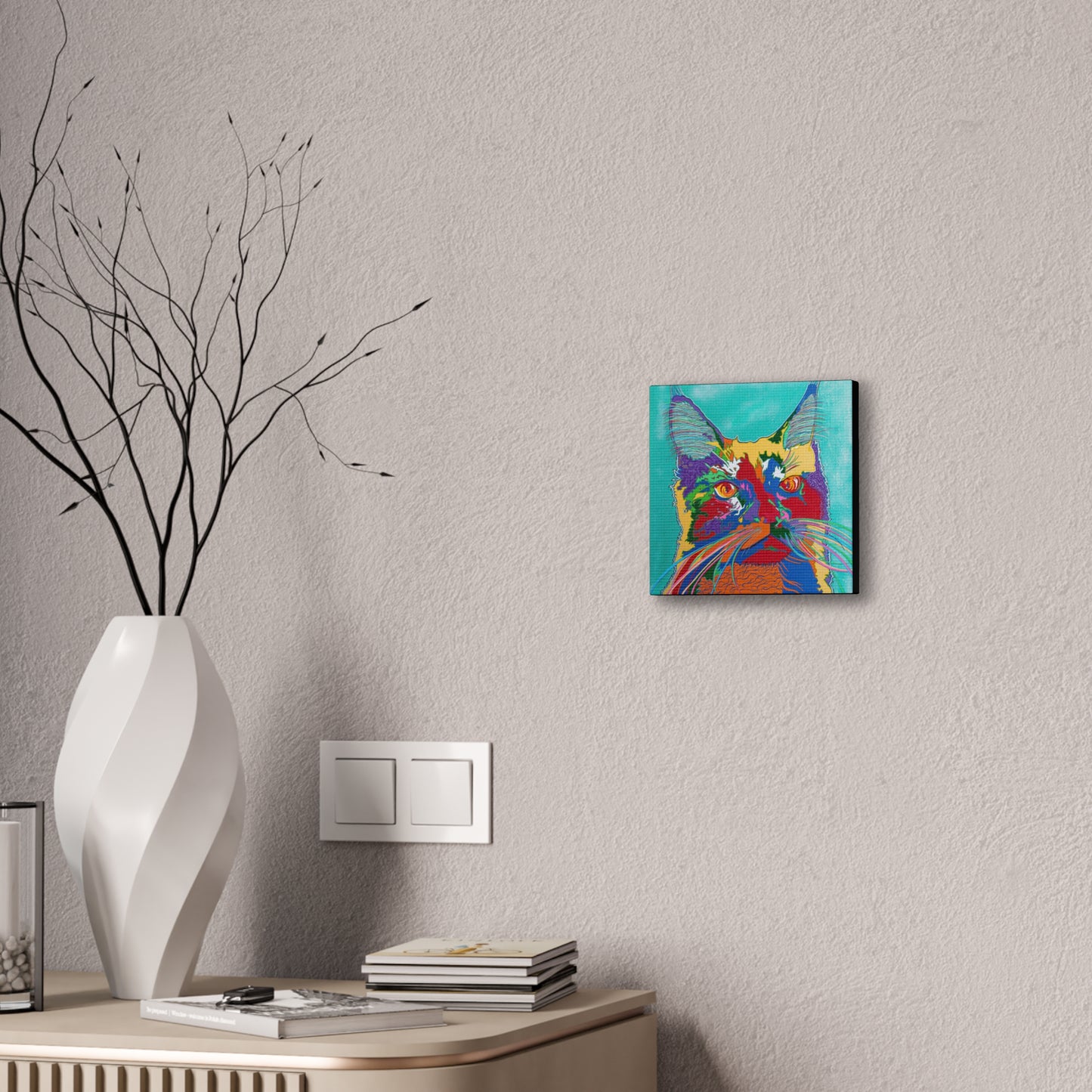 A vibrant, colorful pop art style cat portrait on a canvas gallery wrap.