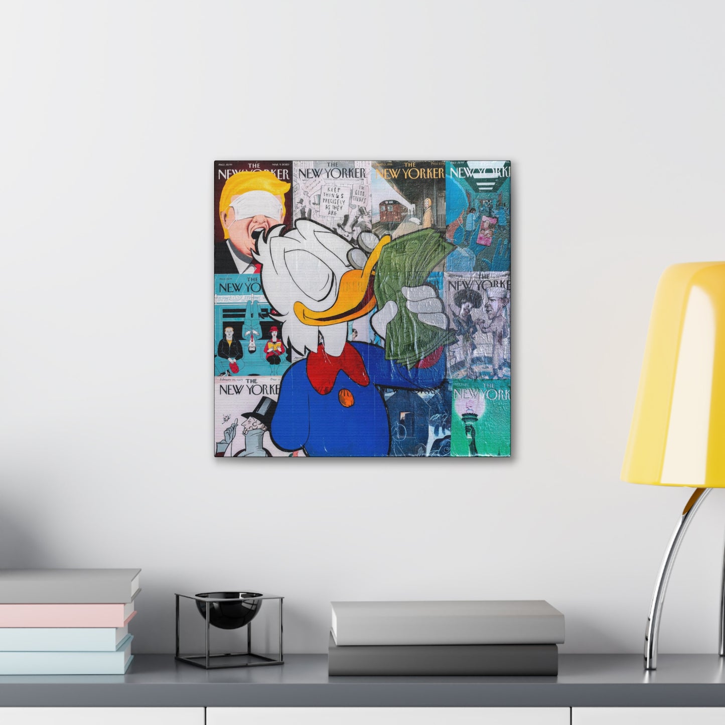 A canvas gallery wrap features a collage of New Yorker covers with Scrooge McDuck holding money.