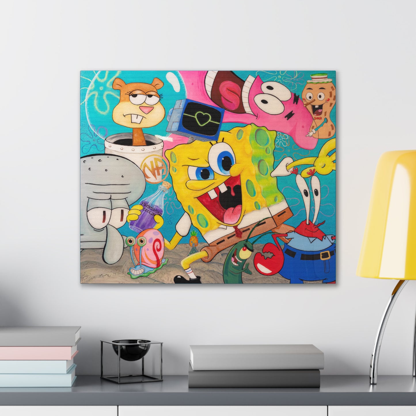 A canvas gallery wrap features a colorful, cartoon-style image of Spongebob characters.