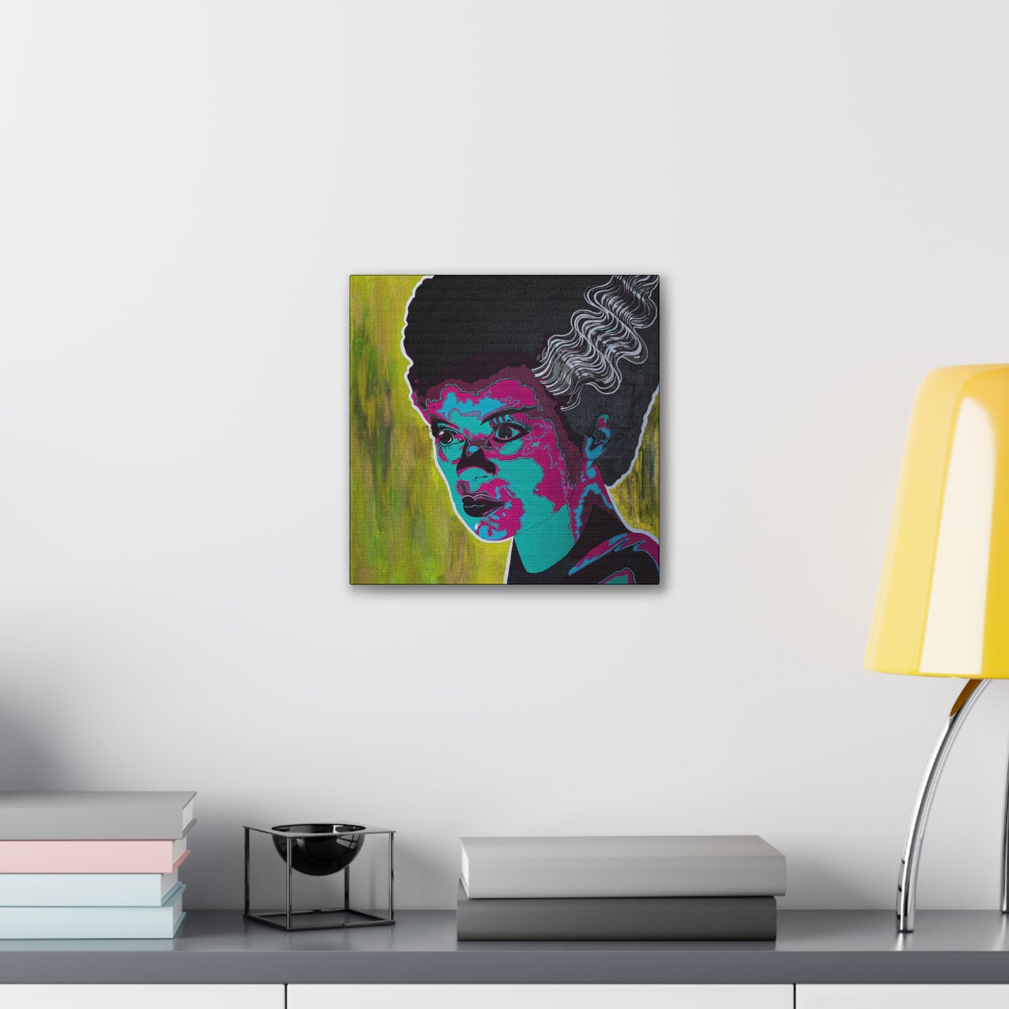 A canvas print of Franky's Bride in pop art style hangs on a white wall.