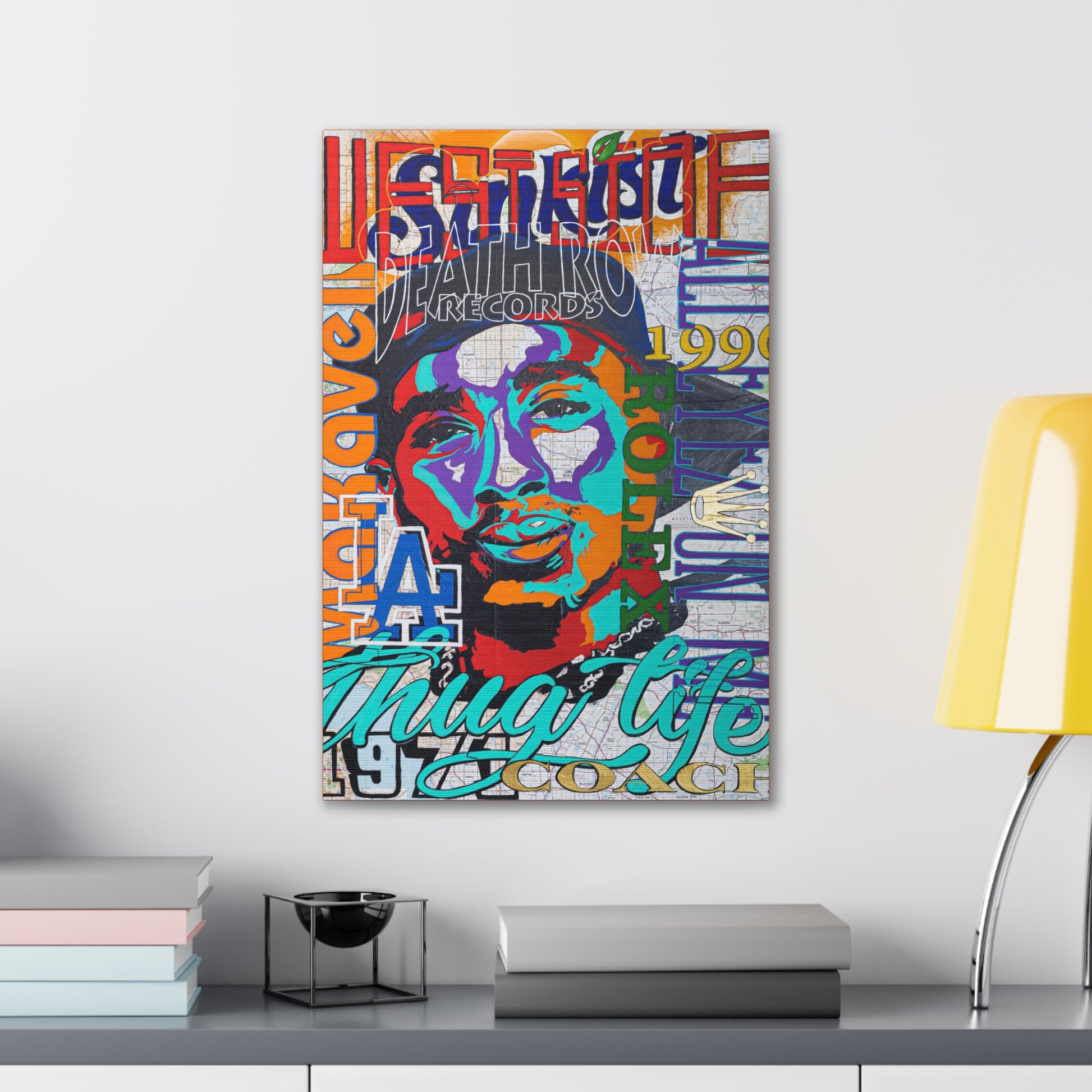 A colorful canvas gallery wrap featuring a pop art style portrait of Tupac Shakur.