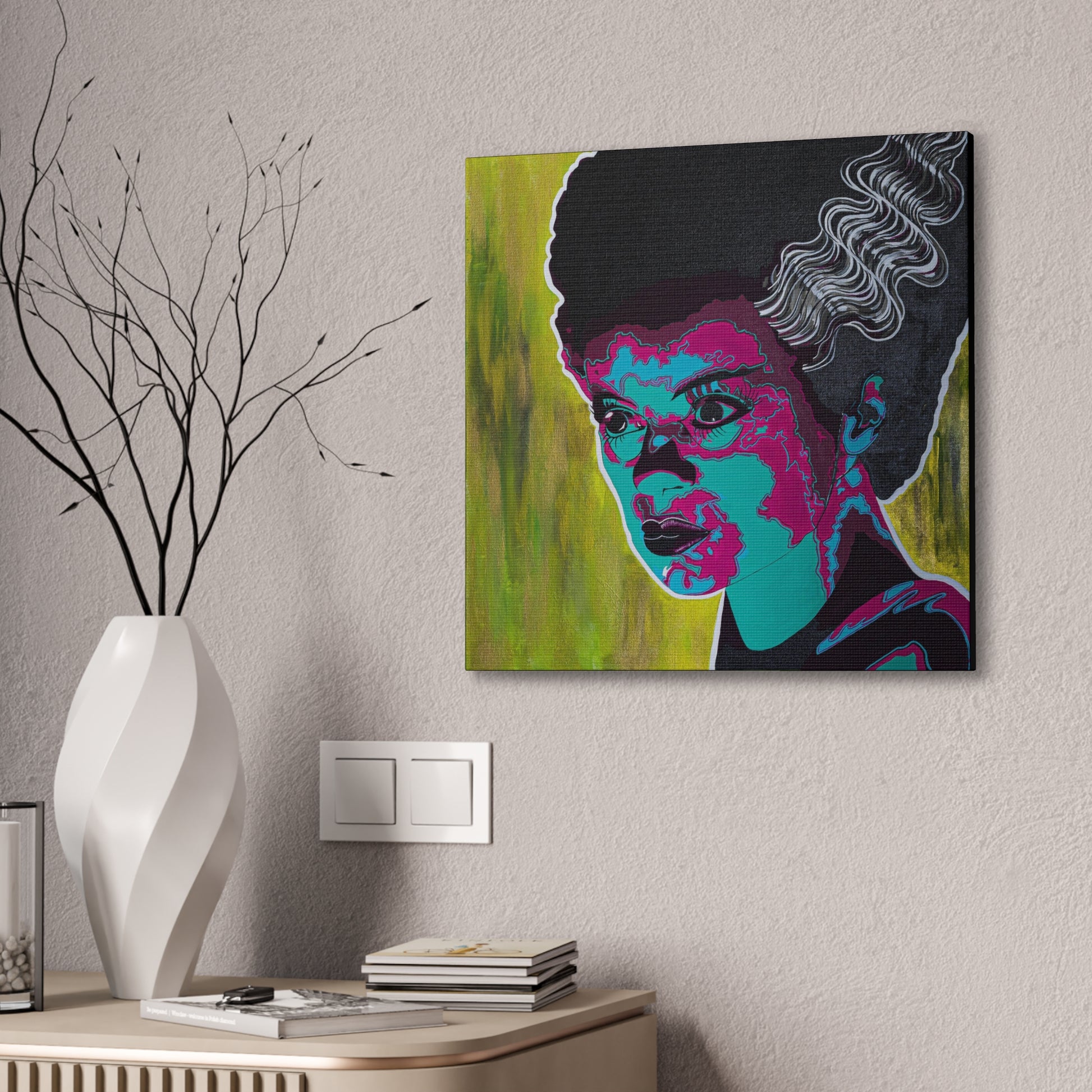 A vibrant pop art canvas print of Franky's Bride hangs on a textured wall.