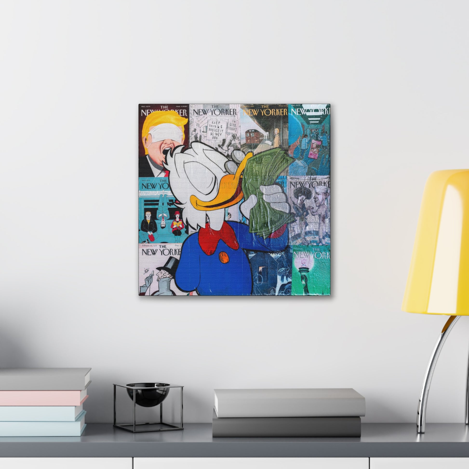 A canvas gallery wrap features a collage of New Yorker covers with Scrooge McDuck holding money.