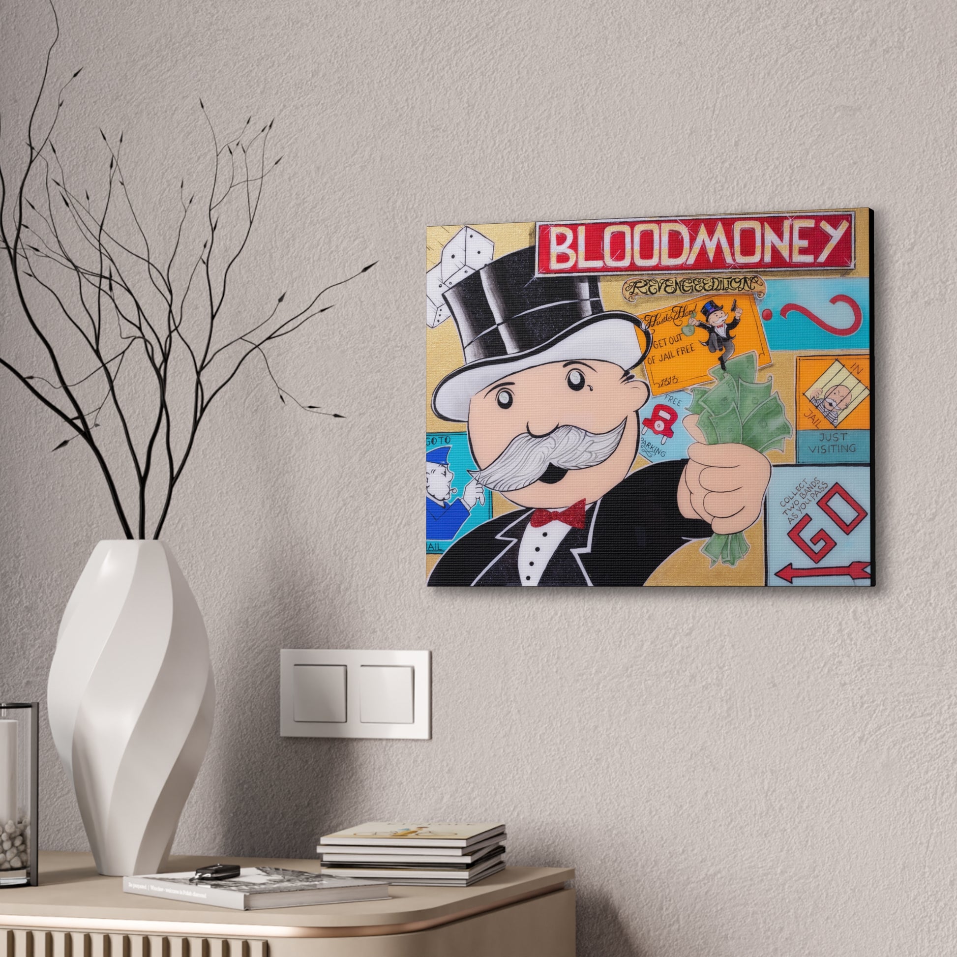 A canvas gallery wrap featuring a Monopoly man holding money with "BLOODMONEY" above.